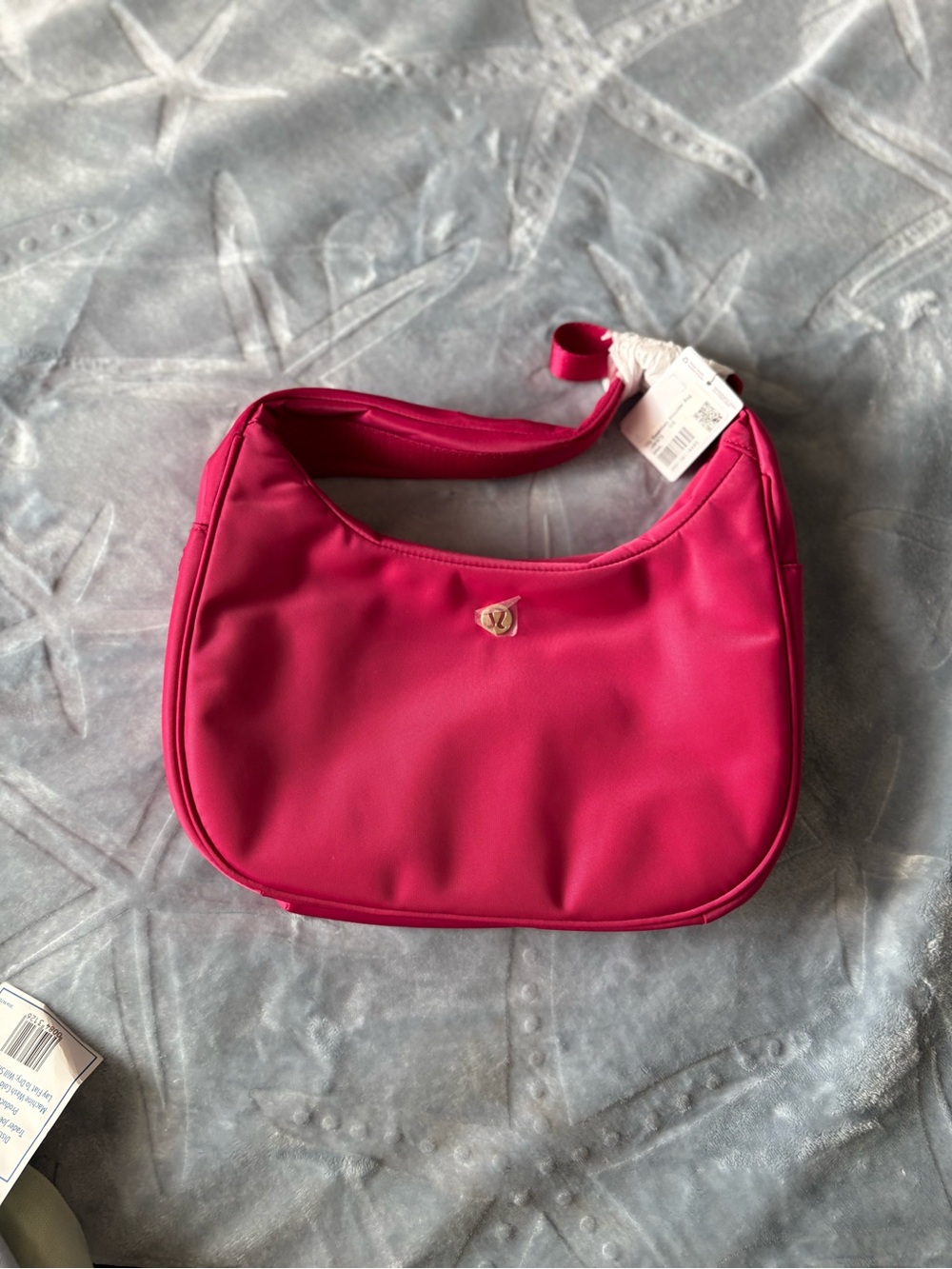 Lululemon city essentials shoulder bag in berry rumble